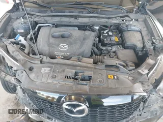 2014 Mazda CX-5 Grand Touring with VIN JM3KE2DY6E0394172, listed as a IAAI auction lot 41698468 with 89,554 mi miles. Bid and sale history available at carsss.com. Image 10.