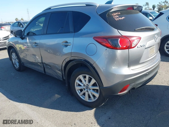 2013 Mazda CX-5 Touring with VIN JM3KE2CE3D0123138, listed as a IAAI auction lot 41818678 with 173,909 mi miles. Bid and sale history available at carsss.com. Image 3.