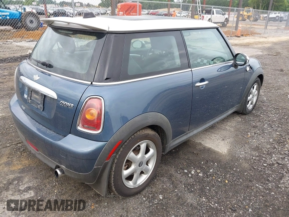 2010 MINI Hardtop with VIN WMWMF3C5XATZ26122, listed as a IAAI auction lot 42377547 with 198,506 mi miles and . Bid and sale history available at DreamBid. Image 4.