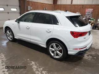 2021 Audi Q3 S line Premium Plus with VIN WA1EECF31M1060356, listed as a IAAI auction lot 42242850 with 83,380 mi miles and . Bid and sale history available at DreamBid. Image 3.