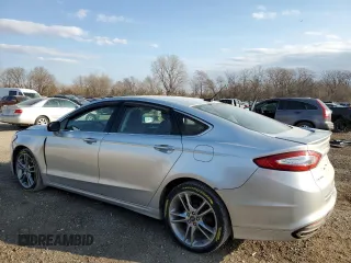 2016 Ford Fusion Titanium with VIN 3FA6P0D99GR278636, listed as a Copart auction lot 50372025 with 164,485 mi miles and Salvage title. Bid and sale history available at DreamBid. Image 2.