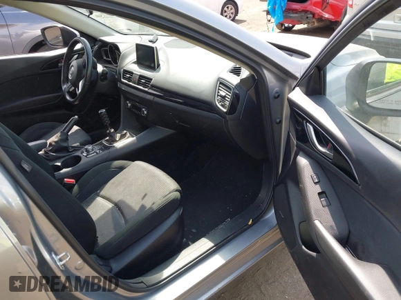 2014 Mazda 3 i Touring with VIN JM1BM1L70E1185972, listed as a IAAI auction lot 42005779 with 90,175 mi miles and . Bid and sale history available at DreamBid. Image 5.
