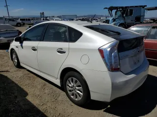 2014 Toyota Prius Plug-In with VIN JTDKN3DP1E3058854, listed as a Copart auction lot 70325814 with 139,953 mi miles and Salvage Title. Bid and sale history available at carsss.com. Image 2.