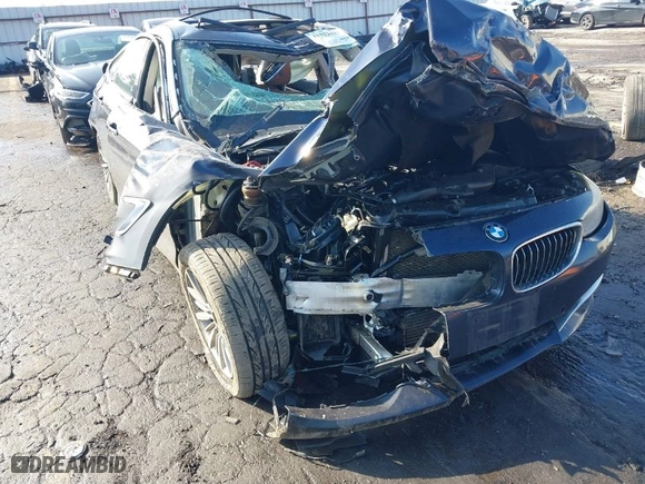 2014 BMW 3 Series Gran Turismo 335i xDrive with VIN WBA3X9C50ED153043, listed as a IAAI auction lot 41522427 with 186,028 mi miles. Bid and sale history available at carsss.com. Image 6.