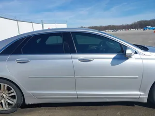 2014 Lincoln MKZ with VIN 3LN6L2G99ER832666, listed as a IAAI auction lot 41732639 with 168,962 mi miles. Bid and sale history available at carsss.com. Image 13.
