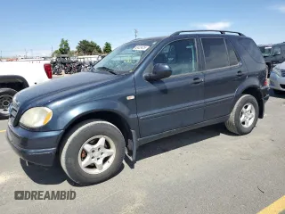 2000 Mercedes-Benz M 320/430/500 with VIN 4JGAB54E8YA200028, listed as a Copart auction lot 62423475 with 69,787 mi miles and Salvage title. Bid and sale history available at DreamBid. Image 1.