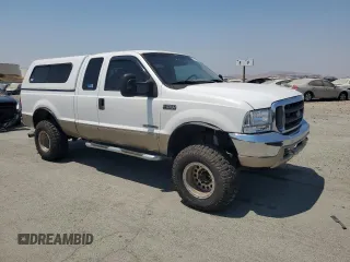 2002 Ford F-250 XL с VIN 1FTNX21F62EB72958, выставлен на аукционе Copart как лот 64620005 с пробегом 167 707 миль миль и Списание • Salvage title. История ставок и продаж доступна на DreamBid. Изображение 4.