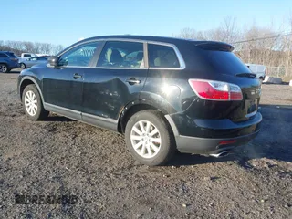 2010 Mazda CX-9 Touring with VIN JM3TB3MV9A0205825, listed as a IAAI auction lot 41040715 with 158,058 mi miles and . Bid and sale history available at DreamBid. Image 3.