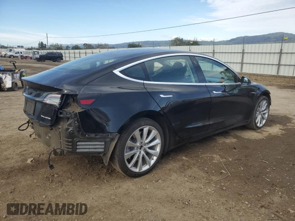 2019 Tesla Model 3 Long Range with VIN 5YJ3E1EB1KF212019, listed as a Copart auction lot 50134385 with 83,478 mi miles and Salvage Title. Bid and sale history available at DreamBid. Image 3.