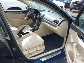 2016 Volkswagen Passat 1.8T S with VIN 1VWAT7A34GC068563, listed as a IAAI auction lot 41983202 with 60,562 mi miles. Bid and sale history available at carsss.com. Image 5.