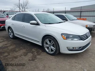2013 Volkswagen Passat TDI SE with VIN 1VWBN7A34DC075197, listed as a IAAI auction lot 41707346 with 188,685 mi miles. Bid and sale history available at carsss.com. Image 1.