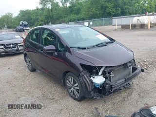 2015 Honda Fit EX z VIN 3HGGK5G80FM751625, wystawiony jako IAAI lot #42427480 z przebiegiem 109 657 mil mil oraz . Historia ofert i sprzedaży dostępna na DreamBid. Obrazek 1.