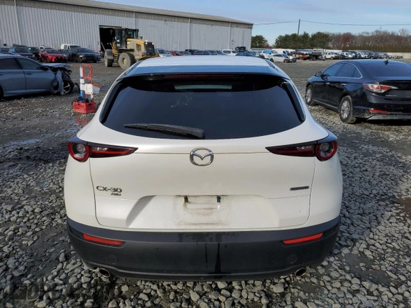 2021 Mazda CX-30 Preferred z VIN 3MVDMBCLXMM222277, wystawiony jako Copart lot #82465924 z przebiegiem 90 863 mil mil oraz Szkoda całkowita • Salvage title. Historia ofert i sprzedaży dostępna na DreamBid. Obrazek 6.