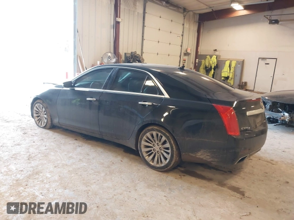 2014 Cadillac CTS Luxury AWD with VIN 1G6AX5SX2E0195357, listed as a IAAI auction lot 41677831 with 152,567 mi miles and . Bid and sale history available at DreamBid. Image 3.