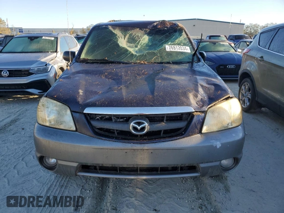 2002 Mazda Tribute LX with VIN 4F2YU09172KM62596, listed as a Copart auction lot 76912034 with 225,892 mi miles and Salvage Title. Bid and sale history available at carsss.com. Image 9.