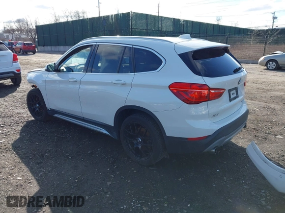 2018 BMW X1 xDrive28i with VIN WBXHT3C34J5L29714, listed as a IAAI auction lot 41825126 with 89,970 mi miles. Bid and sale history available at carsss.com. Image 3.