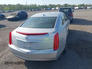2013 Cadillac XTS with VIN 2G61N5S31D9135710, listed as a IAAI auction lot 42002480 with 162,029 mi miles. Bid and sale history available at carsss.com. Image 16.