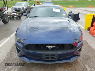2020 Ford Mustang EcoBoost with VIN 1FA6P8TH2L5108722, listed as a IAAI auction lot 42182257 with 65,651 mi miles and . Bid and sale history available at DreamBid. Image 13.