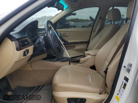 2009 BMW 3 Series 328i with VIN WBAPH77599NM31774, listed as a Copart auction lot 52669315 with 241,355 mi miles and Salvage title. Bid and sale history available at DreamBid. Image 7.