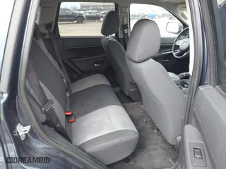 2010 Jeep Grand Cherokee Laredo with VIN 1J4PR4GK5AC138498, listed as a IAAI auction lot 41870740 with 130,551 mi miles. Bid and sale history available at carsss.com. Image 8.