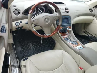 2009 Mercedes-Benz SL 550 с VIN WDBSK71F39F155827, выставлен на аукционе Copart как лот 59483095 с пробегом 74 017 миль миль и Списание • Salvage title. История ставок и продаж доступна на DreamBid. Изображение 8.