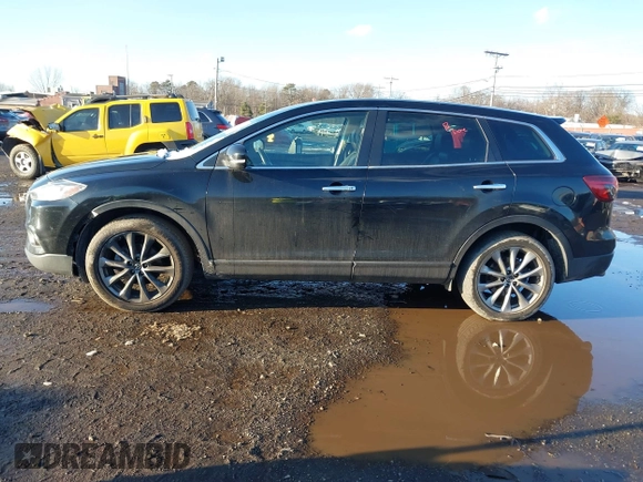 2014 Mazda CX-9 Grand Touring with VIN JM3TB3DV4E0444558, listed as a IAAI auction lot 41538130 with 113,050 mi miles and . Bid and sale history available at DreamBid. Image 14.