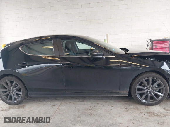 2019 Mazda Mazda3 Hatchback with VIN JM1BPBJM1K1134076, listed as a IAAI auction lot 41643876 with 69,641 mi miles. Bid and sale history available at carsss.com. Image 13.