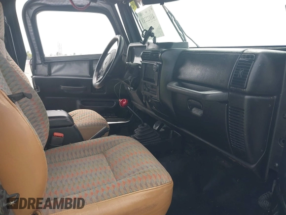 1997 Jeep Wrangler Sport with VIN 1J4FY19S2VP481780, listed as a IAAI auction lot 41822213 with 156,629 mi miles. Bid and sale history available at carsss.com. Image 5.