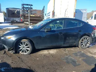 2018 Mazda Mazda3 4-Door Touring with VIN 3MZBN1V31JM200853, listed as a IAAI auction lot 41435526 with 91,684 mi miles. Bid and sale history available at carsss.com. Image 14.