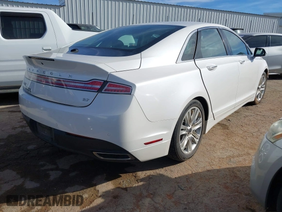 2014 Lincoln MKZ with VIN 3LN6L2GKXER817659, listed as a IAAI auction lot 40896691 with 84,164 mi miles and . Bid and sale history available at DreamBid. Image 4.