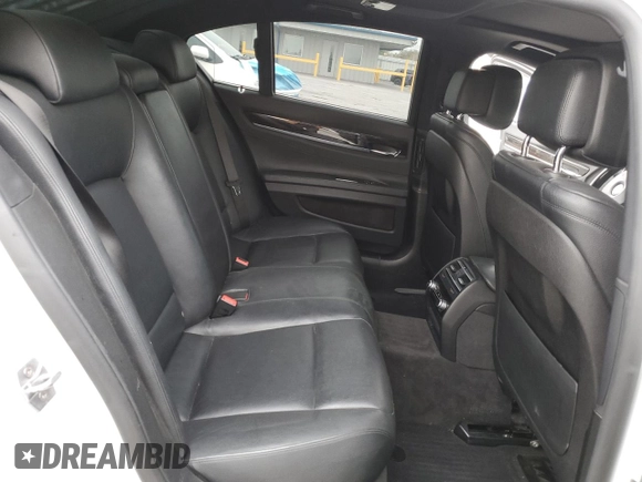 2013 BMW 7 Series 740i with VIN WBAYA6C55DC995290, listed as a Copart auction lot 82022284 with 128,882 mi miles and Salvage Title. Bid and sale history available at carsss.com. Image 10.