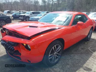 2019 Dodge Challenger SXT z VIN 2C3CDZGG8KH684646, wystawiony jako IAAI lot #41839611 z przebiegiem 113 962 mil mil oraz . Historia ofert i sprzedaży dostępna na DreamBid. Obrazek 2.