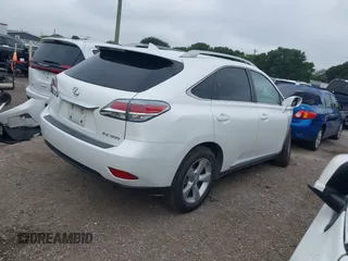 2014 Lexus RX 350 with VIN JTJZK1BA3E2418848, listed as a IAAI auction lot 42401119 with 157,881 mi miles and . Bid and sale history available at DreamBid. Image 4.