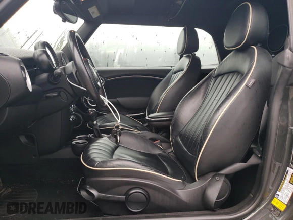 2013 MINI Convertible S с VIN WMWZP3C58DT550592, выставлен на аукционе Copart как лот 56250685 с пробегом 141 821 миль миль и Списание • Salvage title. История ставок и продаж доступна на DreamBid. Изображение 7.