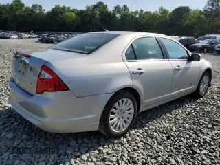 2010 Ford Fusion Hybrid z VIN 3FADP0L31AR150886, wystawiony jako Copart lot #57517255 z przebiegiem 170 137 mil mil oraz Szkoda całkowita • Salvage title. Historia ofert i sprzedaży dostępna na DreamBid. Obrazek 3.