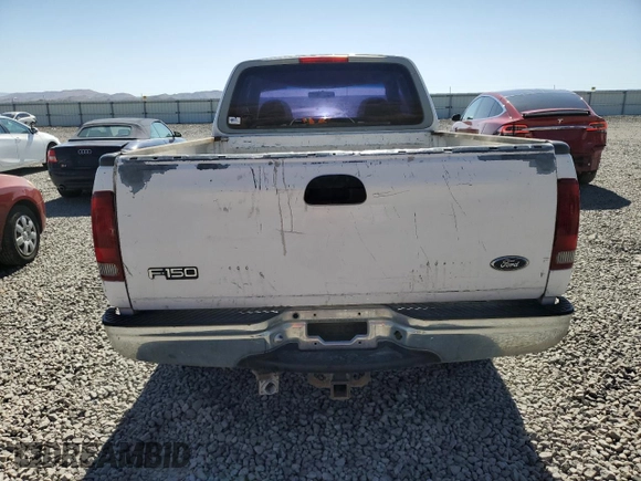 1998 Ford F-150 with VIN 1FTZX1720WKA20813, listed as a Copart auction lot 63852215 with 215,729 mi miles and Salvage title. Bid and sale history available at DreamBid. Image 6.