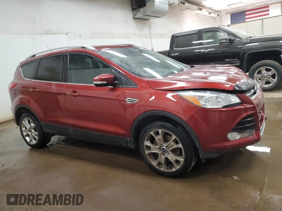 2016 Ford Escape Titanium with VIN 1FMCU9J95GUC57205, listed as a Copart auction lot 71033934 with 90,477 mi miles and Salvage Title. Bid and sale history available at DreamBid. Image 4.