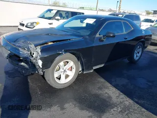 2012 Dodge Challenger SXT Plus z VIN 2C3CDYAG6CH125164, wystawiony jako IAAI lot #41754809 z przebiegiem 95 882 mil mil oraz . Historia ofert i sprzedaży dostępna na DreamBid. Obrazek 18.
