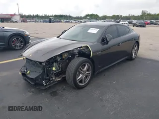 2015 Porsche Panamera 4 с VIN WP0AA2A71FL002436, выставлен на аукционе IAAI как лот 42479904 с пробегом 64 750 миль миль и . История ставок и продаж доступна на DreamBid. Изображение 2.