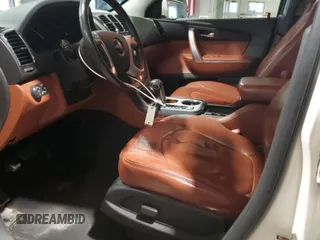 2009 GMC Acadia SLT1 with VIN 1GKER23DX9J219842, listed as a Copart auction lot 49786365 with 160,818 mi miles and Salvage Title. Bid and sale history available at carsss.com. Image 7.