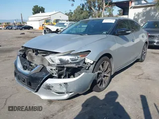 2017 Nissan Maxima Platinum with VIN 1N4AA6AP2HC414204, listed as a IAAI auction lot 42394624 with 80,486 mi miles and . Bid and sale history available at DreamBid. Image 2.