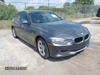 2013 BMW 3 Series 320i with VIN WBA3B1C5XDF462859, listed as a IAAI auction lot 42191369 with 140,253 mi miles and . Bid and sale history available at carsss.com. Image 1.