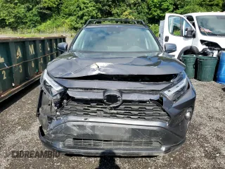 2024 Toyota RAV4 XLE Premium with VIN 2T3C1RFV1RC284430, listed as a Copart auction lot 65069965 with 4,688 mi miles and Salvage title. Bid and sale history available at DreamBid. Image 5.