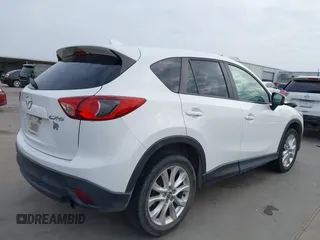 2013 Mazda CX-5 Grand Touring with VIN JM3KE2DEXD0166115, listed as a IAAI auction lot 41919164 with 102,999 mi miles and . Bid and sale history available at carsss.com. Image 4.