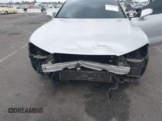 2013 Audi A7 3.0 Premium Plus with VIN WAUYGAFC7DN076830, listed as a IAAI auction lot 41447727 with 107,517 mi miles. Bid and sale history available at carsss.com. Image 6.