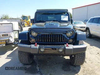 2014 Jeep Wrangler Unlimited Sahara with VIN 1C4BJWEG1EL258242, listed as a IAAI auction lot 41894966 with 90,234 mi miles. Bid and sale history available at carsss.com. Image 12.