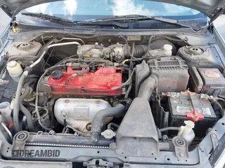 2004 Mitsubishi Lancer ES with VIN JA3AJ26E54U054570, listed as a IAAI auction lot 41592397 with 220,140 mi miles. Bid and sale history available at carsss.com. Image 10.