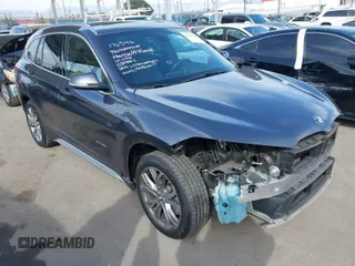 2017 BMW X1 xDrive28i with VIN WBXHT3Z32H4A65838, listed as a IAAI auction lot 41742881 with 55,307 mi miles. Bid and sale history available at carsss.com. Image 1.