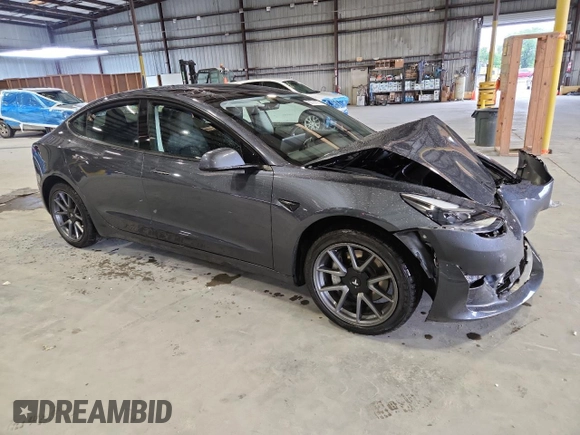 2023 Tesla Model 3 with VIN 5YJ3E1EA4PF554840, listed as a Copart auction lot 63731175 with Not provided miles and Salvage title. Bid and sale history available at DreamBid. Image 4.