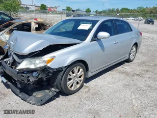 2012 Toyota Avalon with VIN 4T1BK3DB7CU446235, listed as a IAAI auction lot 41957507 with 111,094 mi miles. Bid and sale history available at carsss.com. Image 17.